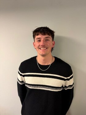 Staff member Ian Stapf from 63ba7cf0506d