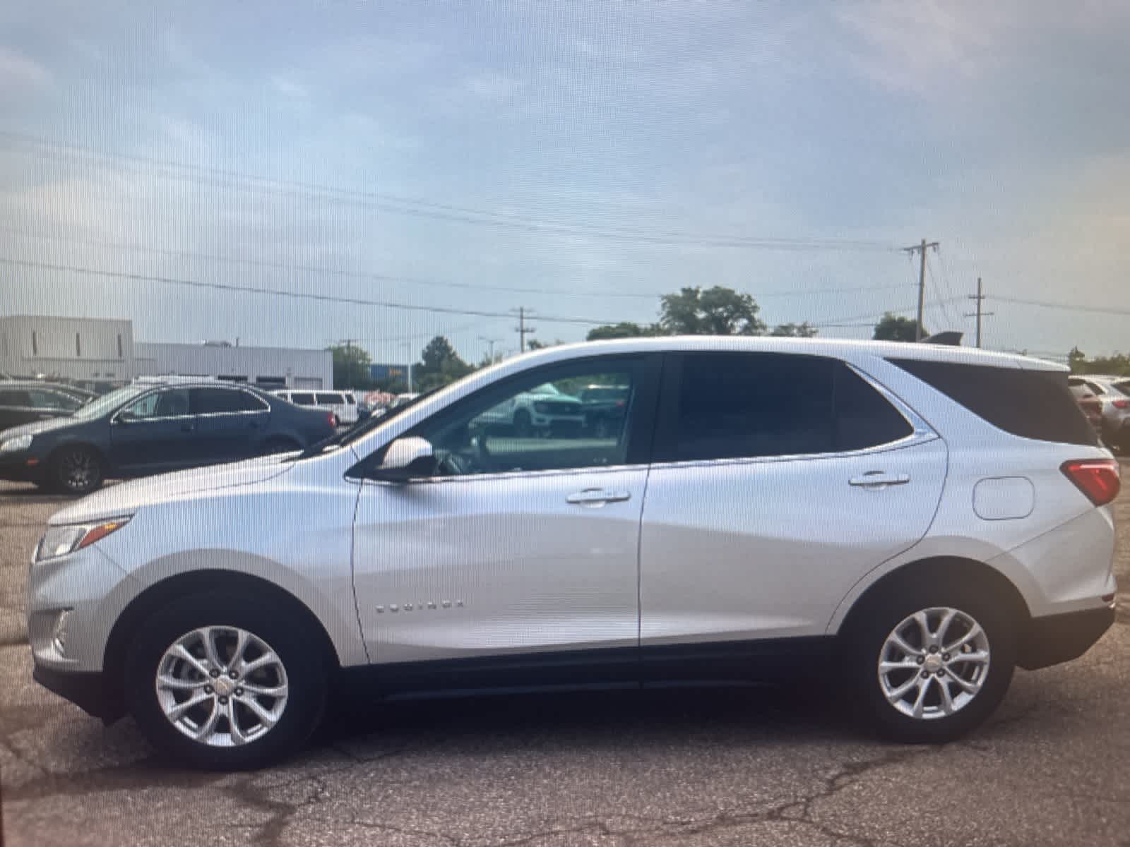 Used 2021 Chevrolet Equinox LT with VIN 3GNAXUEV2MS122263 for sale in Spokane, WA