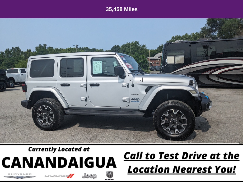 Used 2022 Jeep Wrangler Unlimited Sahara 4XE with VIN 1C4JJXP6XNW279272 for sale in Canandaigua, NY