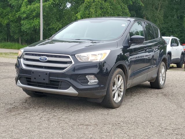 Used 2017 Ford Escape SE with VIN 1FMCU9GD7HUE77569 for sale in Charlotte, MI