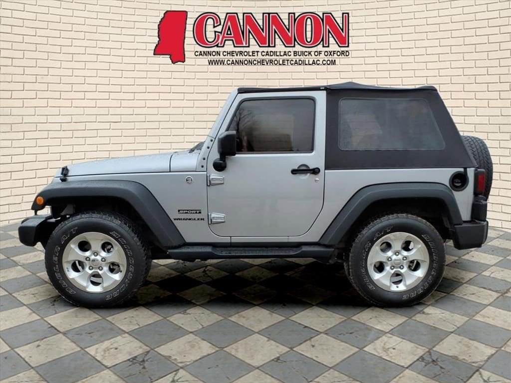 Used 2015 Jeep Wrangler Sport with VIN 1C4AJWAG2FL714574 for sale in Greenwood, MS