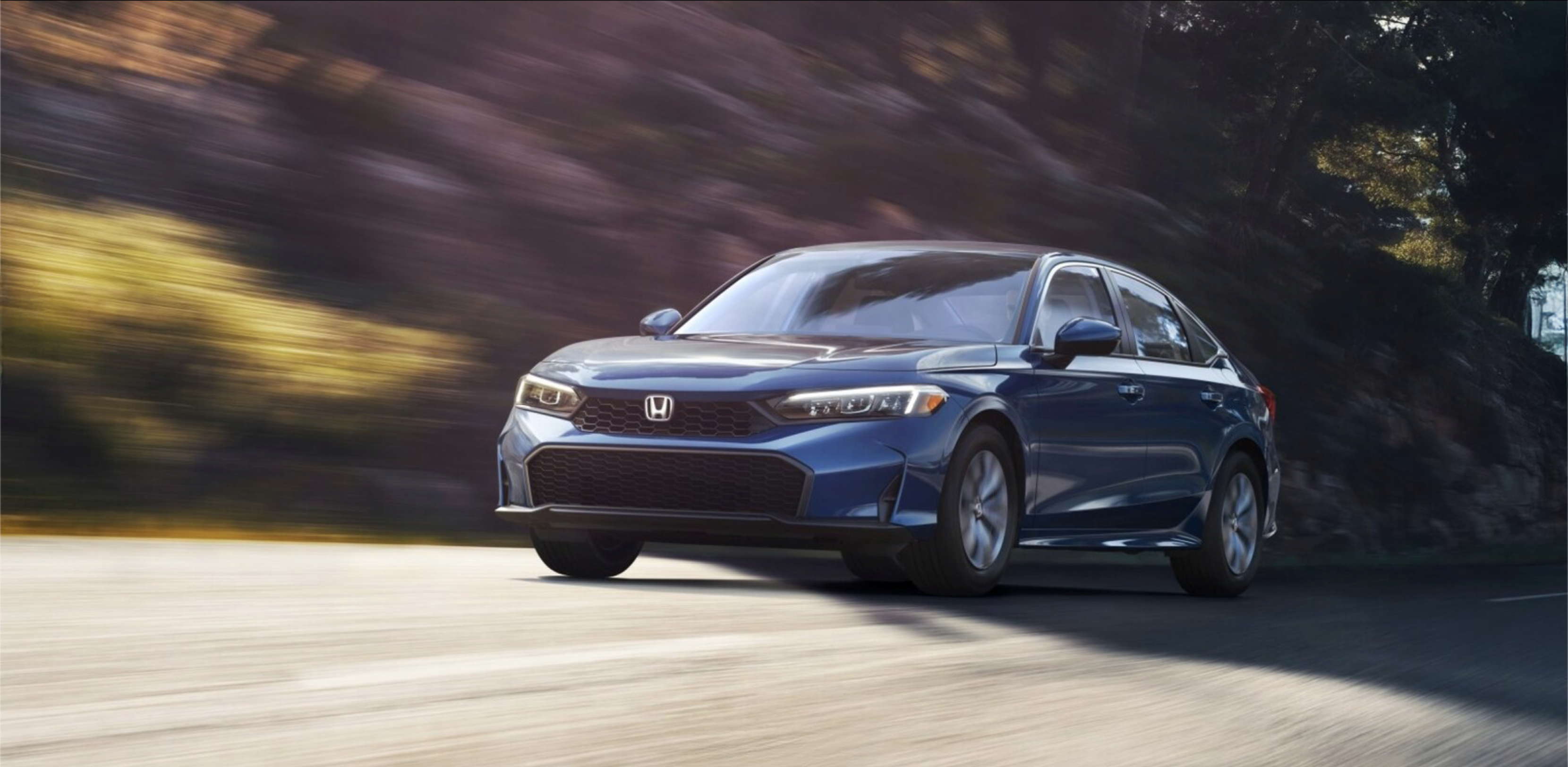 Honda lease sedan on the road