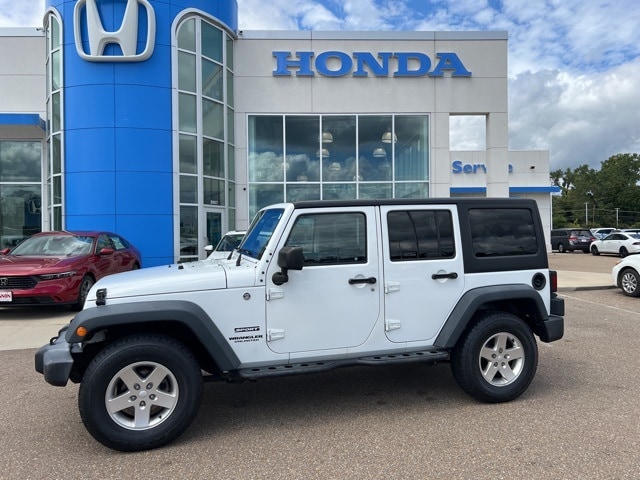 Used 2015 Jeep Wrangler Unlimited Sport with VIN 1C4BJWDG5FL691923 for sale in Vicksburg, MS