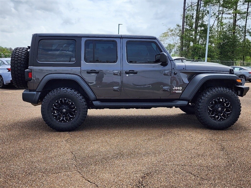 Used 2019 Jeep Wrangler Unlimited Sport with VIN 1C4HJXDG0KW646719 for sale in Jackson, MS