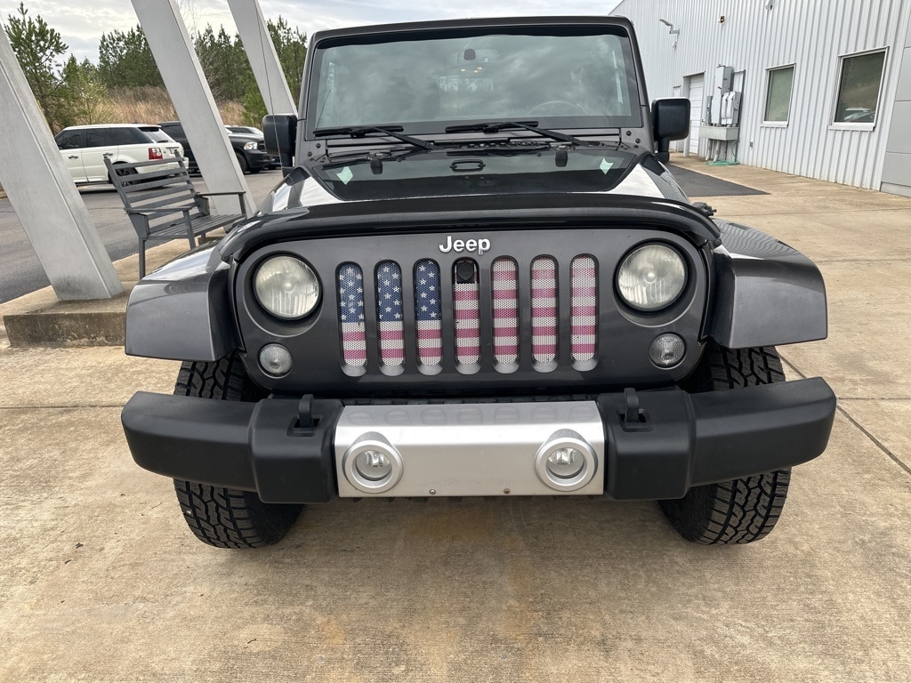 Used 2014 Jeep Wrangler Unlimited Sahara with VIN 1C4BJWEG4EL299609 for sale in Grenada, MS