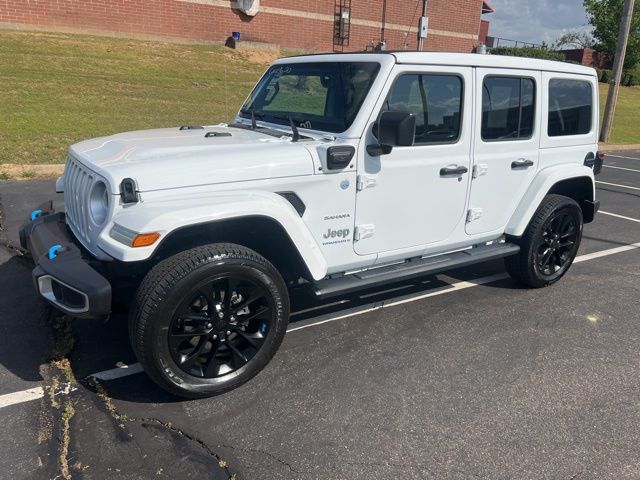 Used 2023 Jeep Wrangler 4xe Sahara 4XE with VIN 1C4JJXP64PW555027 for sale in Grenada, MS