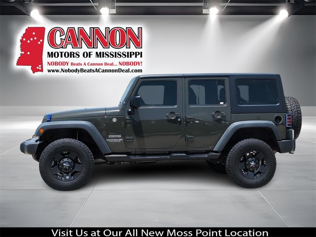 Used 2015 Jeep Wrangler Unlimited Sport with VIN 1C4BJWDG8FL737387 for sale in Moss Point, MS