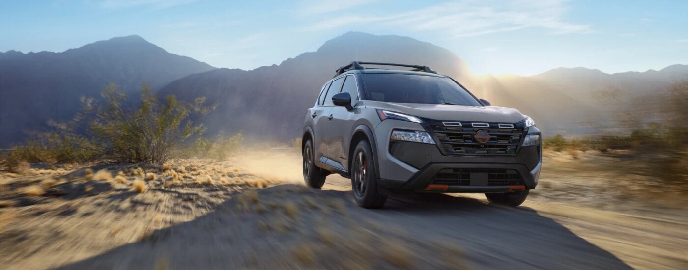A grey 2025 Nissan Rogue Rock Creek from the front.