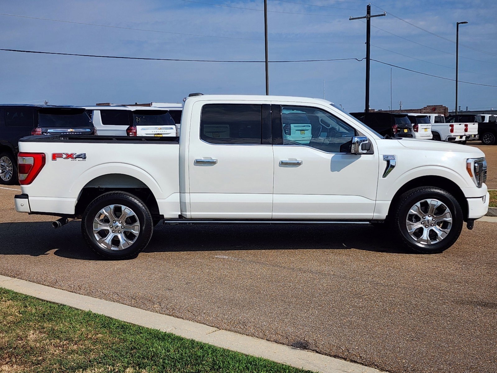 Used 2021 Ford F-150 Platinum with VIN 1FTFW1E59MFA81392 for sale in Madison, MS