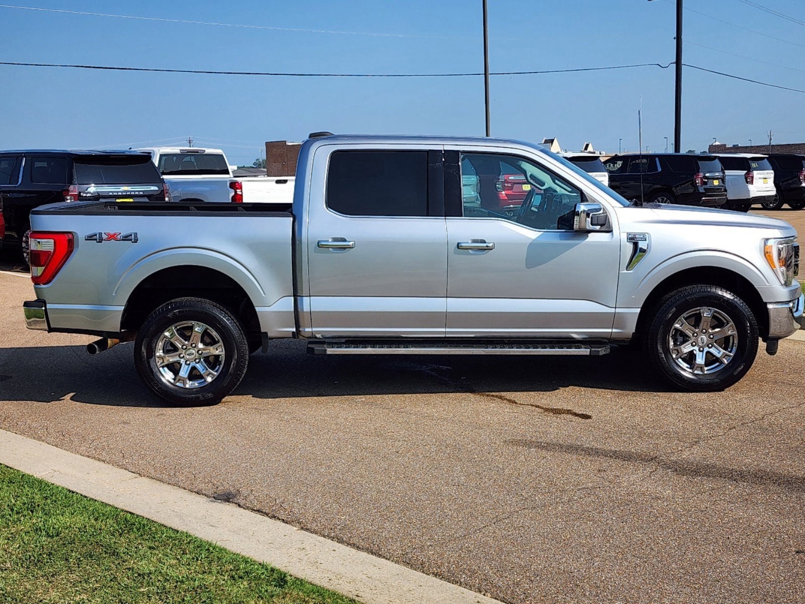 Used 2021 Ford F-150 Lariat with VIN 1FTFW1E88MKE57145 for sale in Madison, MS