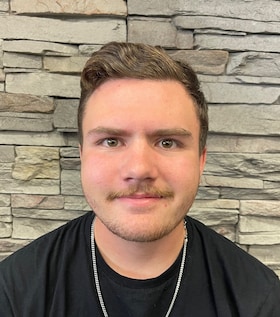 Staff member Thomas Bradley from ID_115e7029a3f0