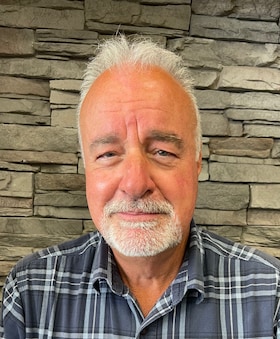 Staff member John Andrews from ID_7519f68d3d60