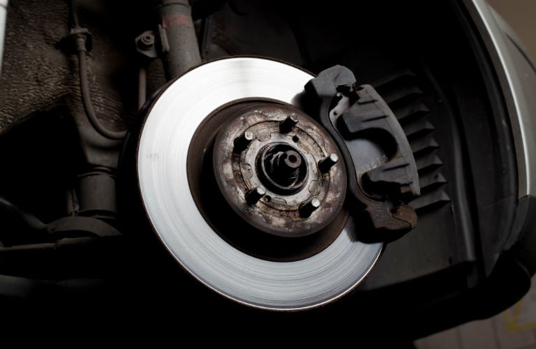 Picture of brake pads being replaced
