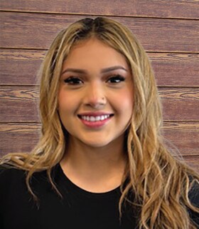 Staff member Lucy Campos from ID_a917df18e49b