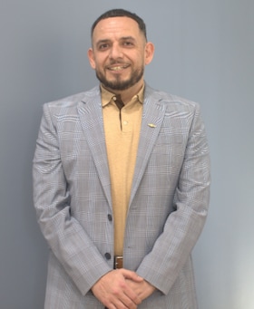 Staff member Kris Santoscoy from ID_e6d90c1d4bdc