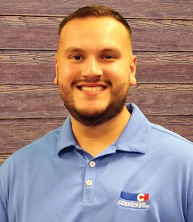 Staff member Adrian Gutierez from ID_47712b