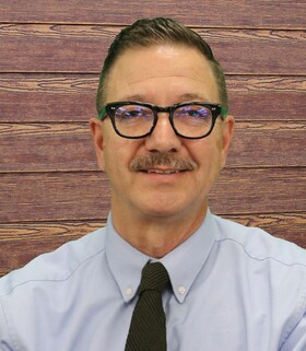 Staff member Adam Smith from ID_b358bb