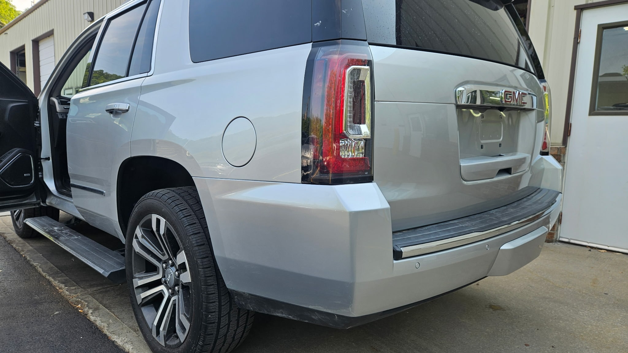 Insurance claim collision repair at Car City Wholesale's body shop in Shawnee, KS