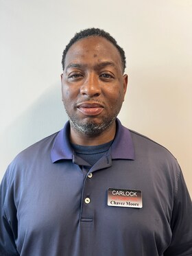 Staff member Chavez Moore from 64c33dc093ad