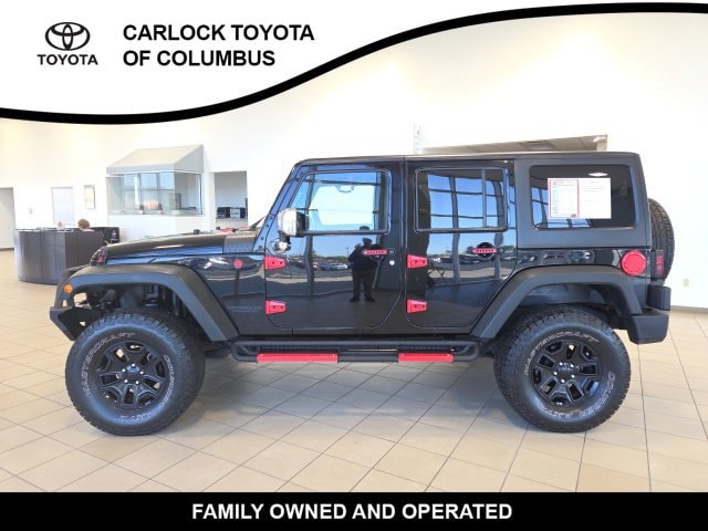 Used 2016 Jeep Wrangler Unlimited Willys Wheeler with VIN 1C4BJWDG4GL180236 for sale in Taylorsville, IN