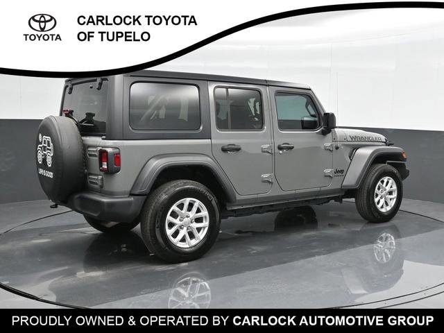 Used 2023 Jeep Wrangler 4-Door Sport S with VIN 1C4HJXDG5PW653723 for sale in Saltillo, MS