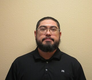 Staff member Isaac Juarez from ID_f54e70b8a17e