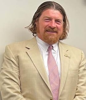 Staff member BIG JOHN CARLSON from ID_b560b5