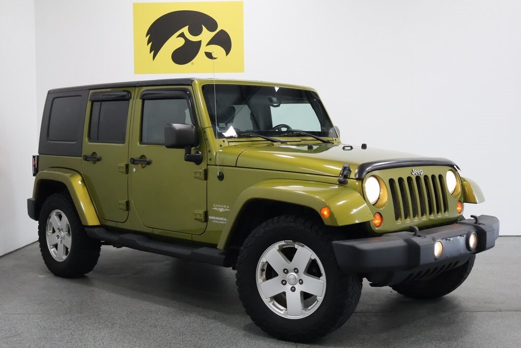 Used 2010 Jeep Wrangler Unlimited Sahara with VIN 1J4HA5H12AL230790 for sale in Iowa City, IA