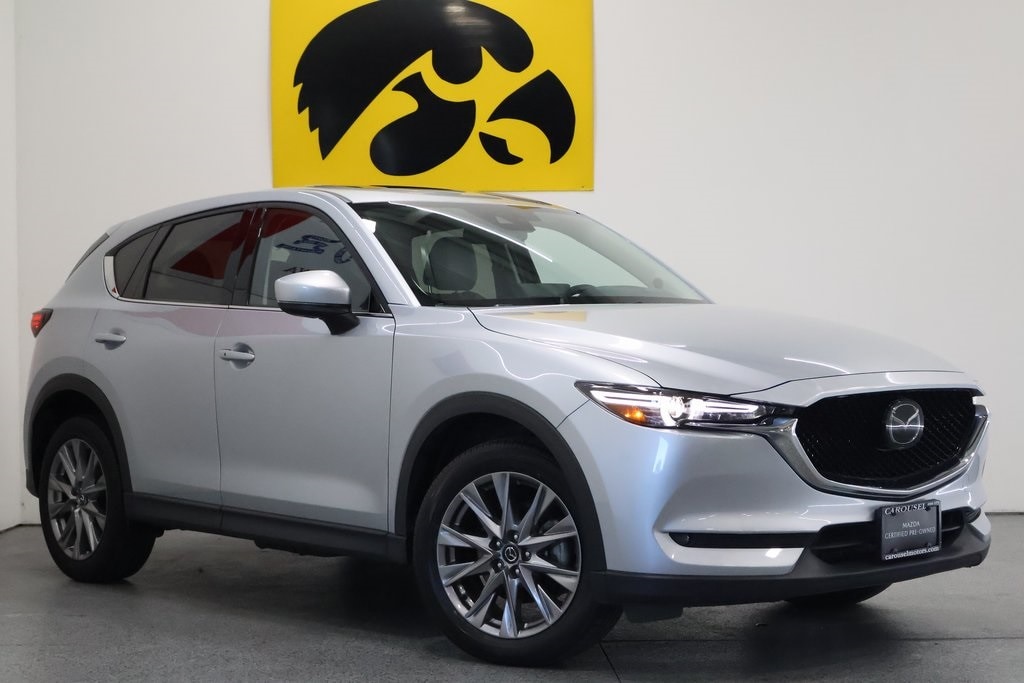 Certified 2021 Mazda CX-5 Grand Touring Reserve with VIN JM3KFBAY8M0476095 for sale in Iowa City, IA