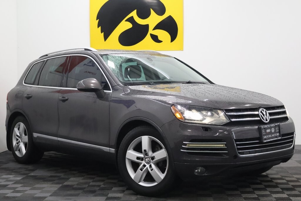 Used 2011 Volkswagen Touareg Sport with VIN WVGFK9BP5BD006970 for sale in Iowa City, IA