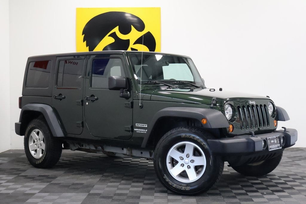 Used 2011 Jeep Wrangler Unlimited Sport with VIN 1J4BA3H17BL589841 for sale in Iowa City, IA