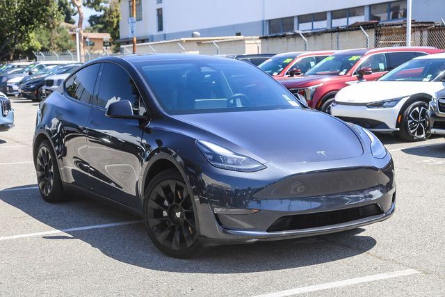 Used 2024 Tesla Model Y Long Range with VIN 7SAYGAEEXRF084841 for sale in Glendale, CA