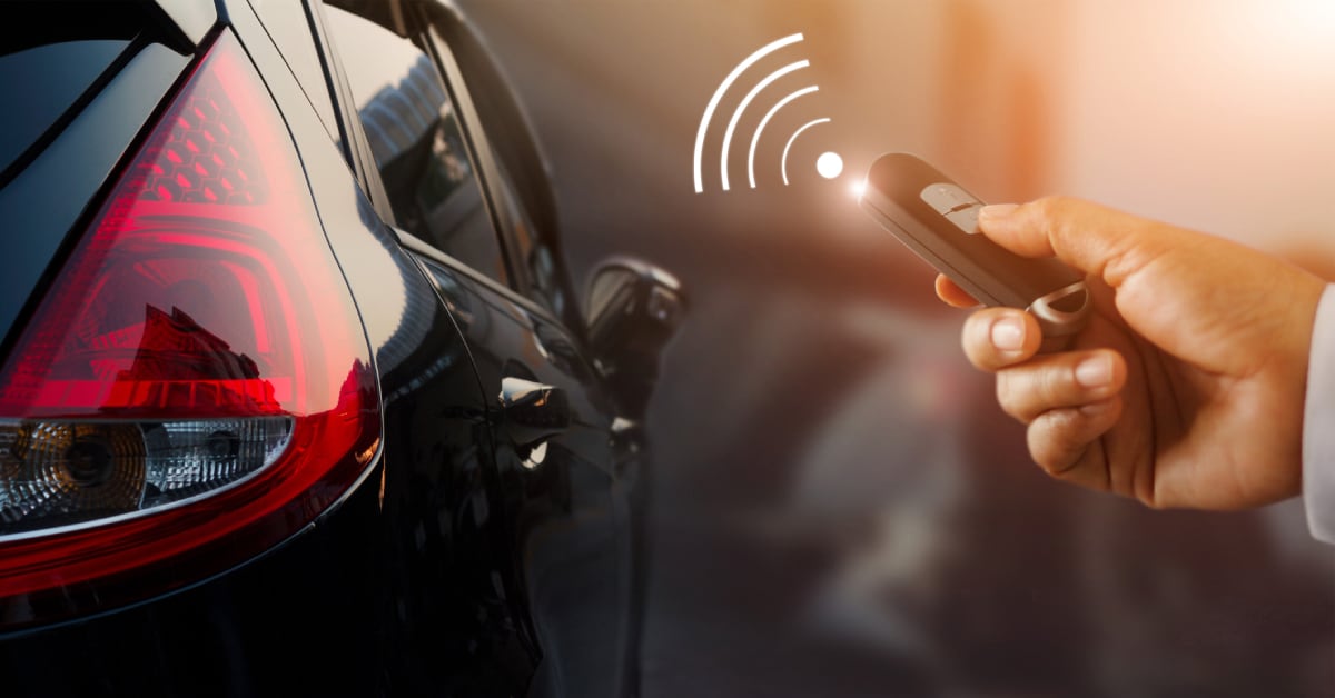a%20hand%20pressing%20the%20car%20keys%20remote%20to%20access%20the%20car.jpg