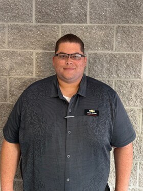 Staff member Dexter Mullan from 51812f983025