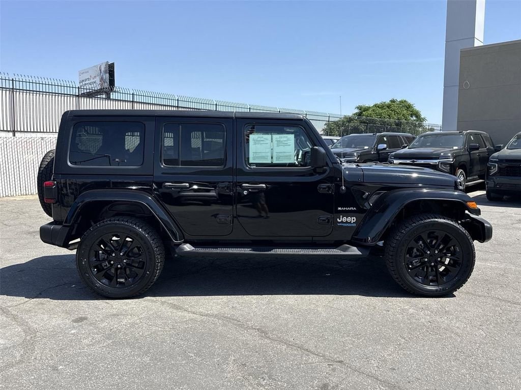 Used 2021 Jeep Wrangler Unlimited Sahara 4XE with VIN 1C4JJXP67MW800883 for sale in Carson, CA