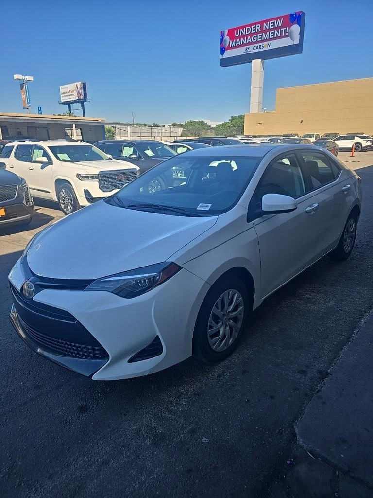 Used 2018 Toyota Corolla LE with VIN 5YFBURHE4JP761364 for sale in Carson, CA