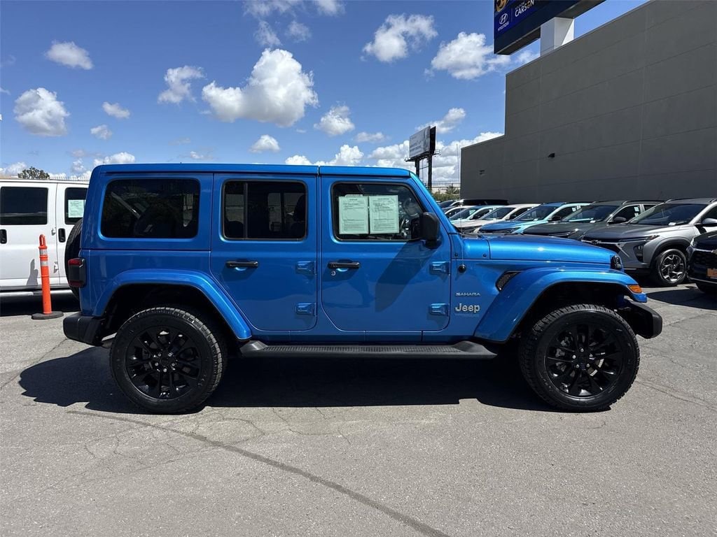 Used 2022 Jeep Wrangler Unlimited Sahara 4XE with VIN 1C4JJXP64NW199062 for sale in Carson, CA
