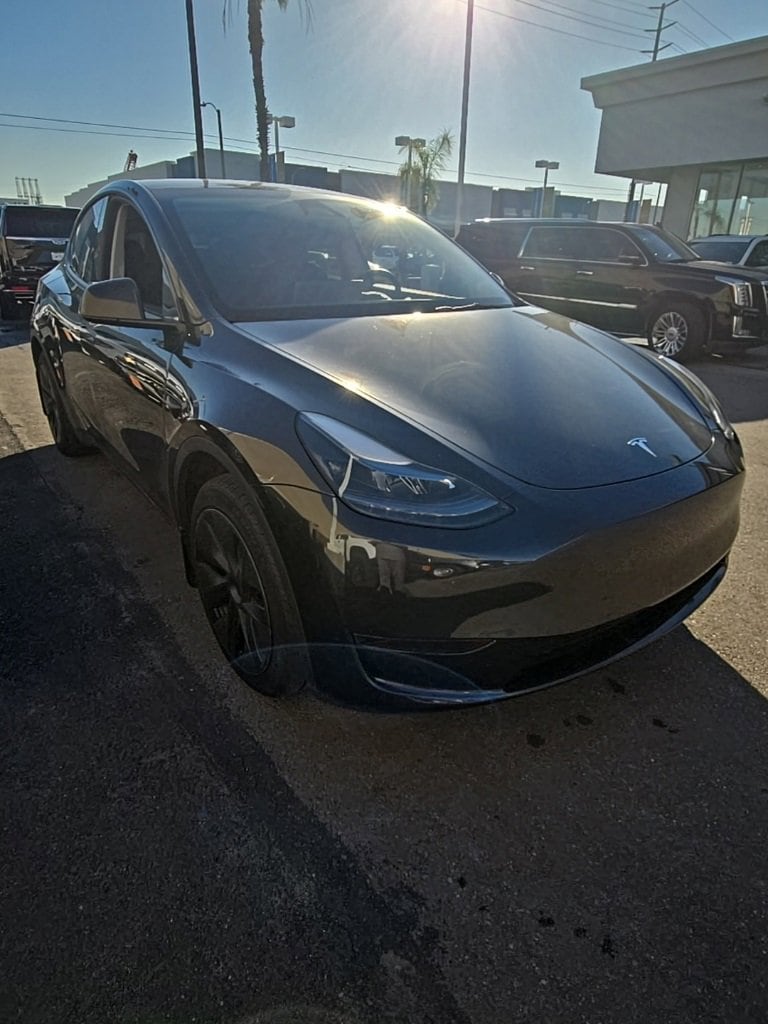 Used 2024 Tesla Model Y Long Range with VIN 7SAYGDED7RF205530 for sale in Carson, CA