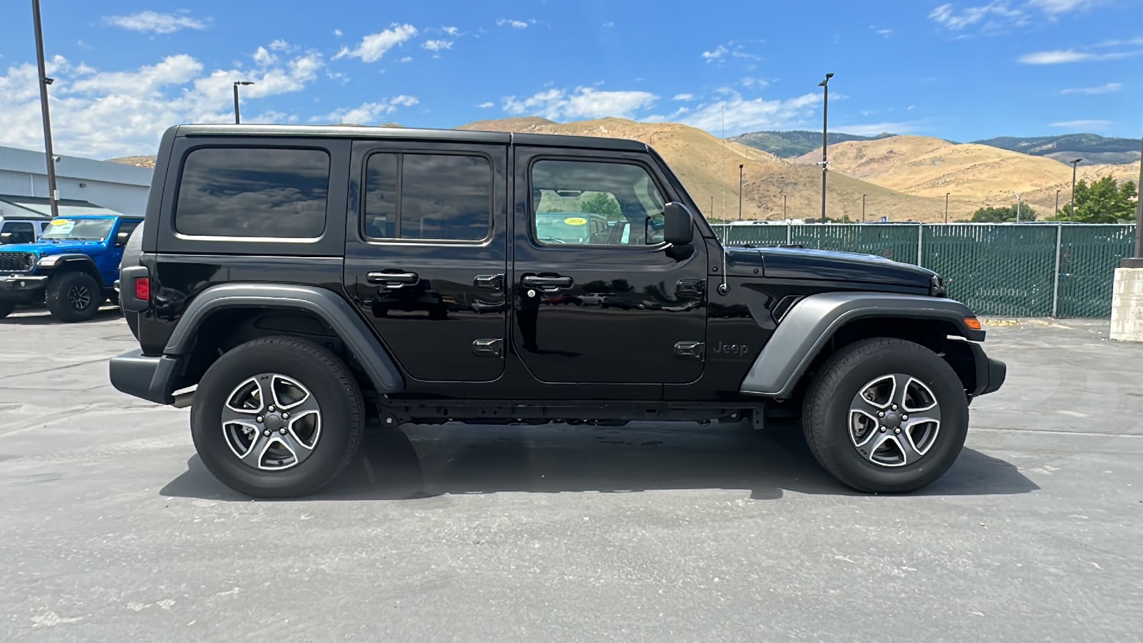 Used 2023 Jeep Wrangler 4-Door Sport S with VIN 1C4HJXDG5PW622651 for sale in Carson City, NV