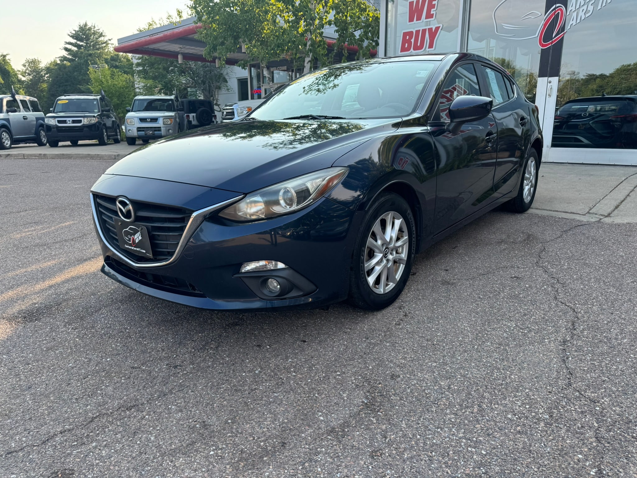 Blue 2015 Mazda MAZDA3 Hatchback Front-Wheel Drive 6-Speed Automatic
