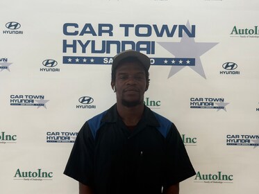 Staff member Isaiah Thompson from ID_a30902