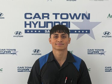 Staff member Alejandro Rodriguez from ID_a30902