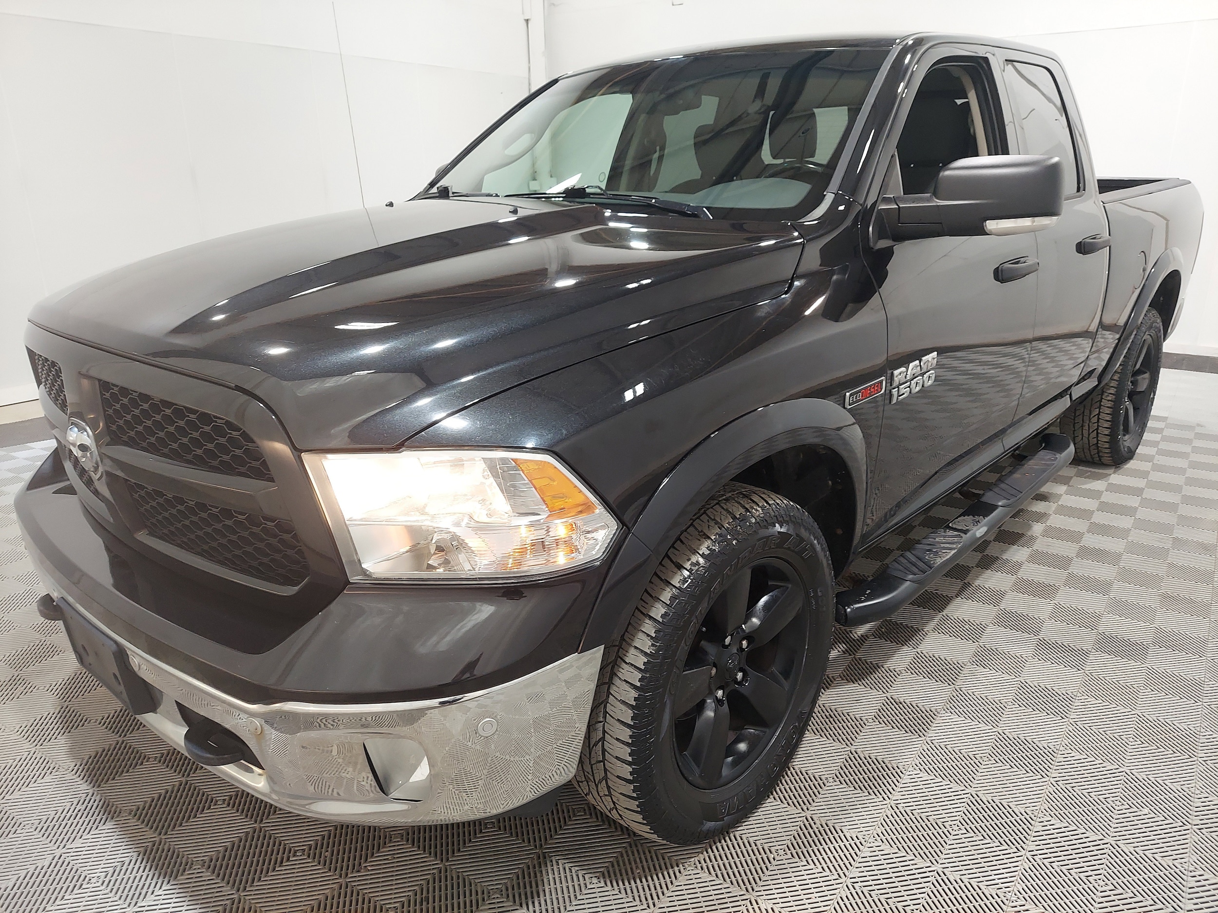 2016 RAM 1500 Outdoorsman Quad Cab 4x4 6'4" Box's photo