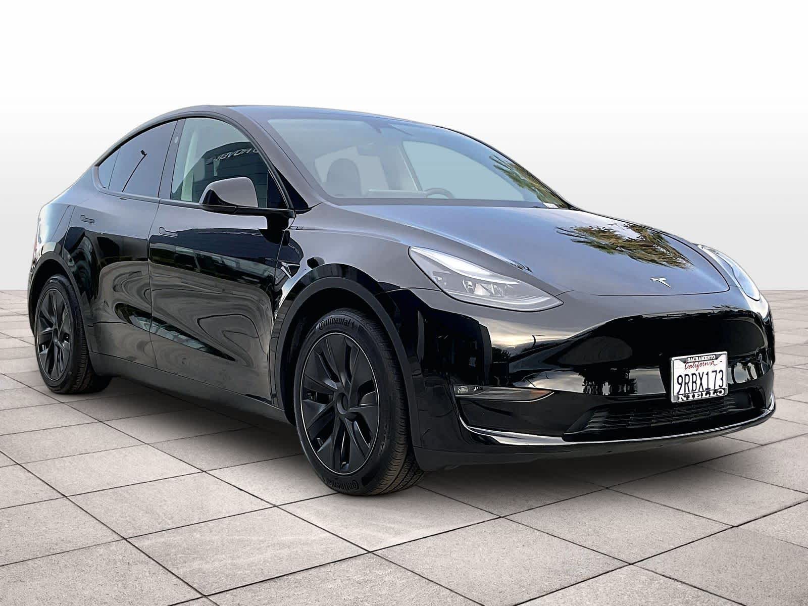 Used 2025 Tesla Model Y Long Range with VIN 7SAYGAEE7SF254580 for sale in Sacramento, CA