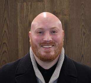 Staff member Lucas Gardner from 9601181df414