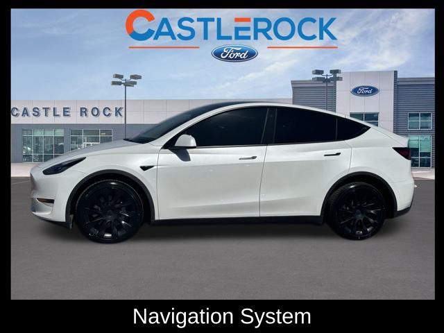 Used 2023 Tesla Model Y Long Range with VIN 7SAYGDEE0PA124095 for sale in Castle Rock, CO