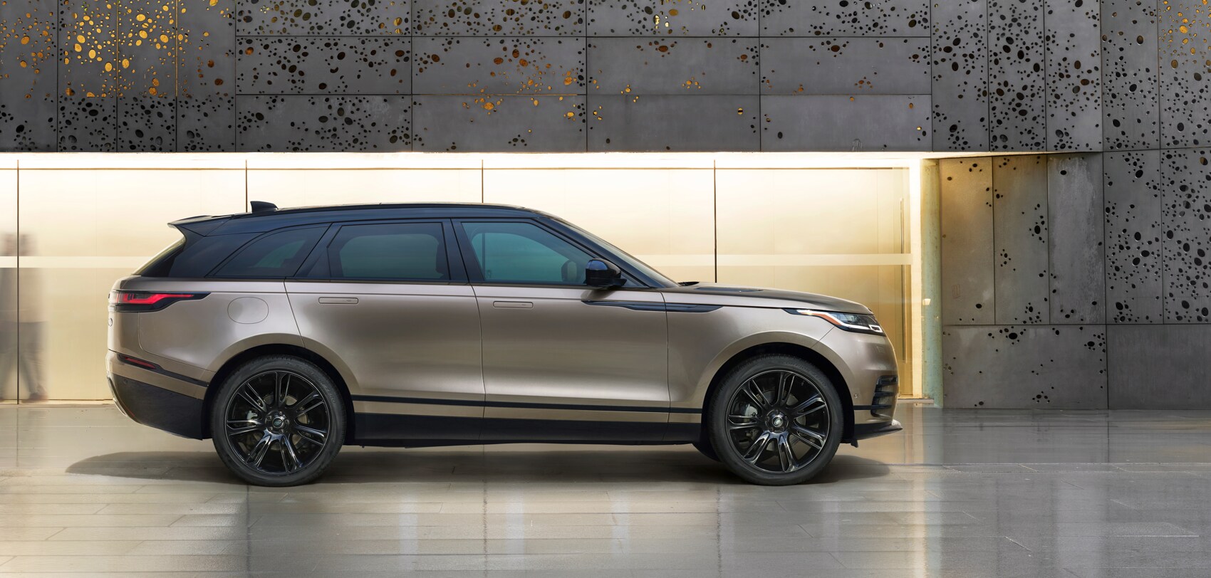 Side Profile of a 2023 Land Rover Range Rover Velar in Lantau Bronze color, available at Land Rover Thousand Oaks in the LA area