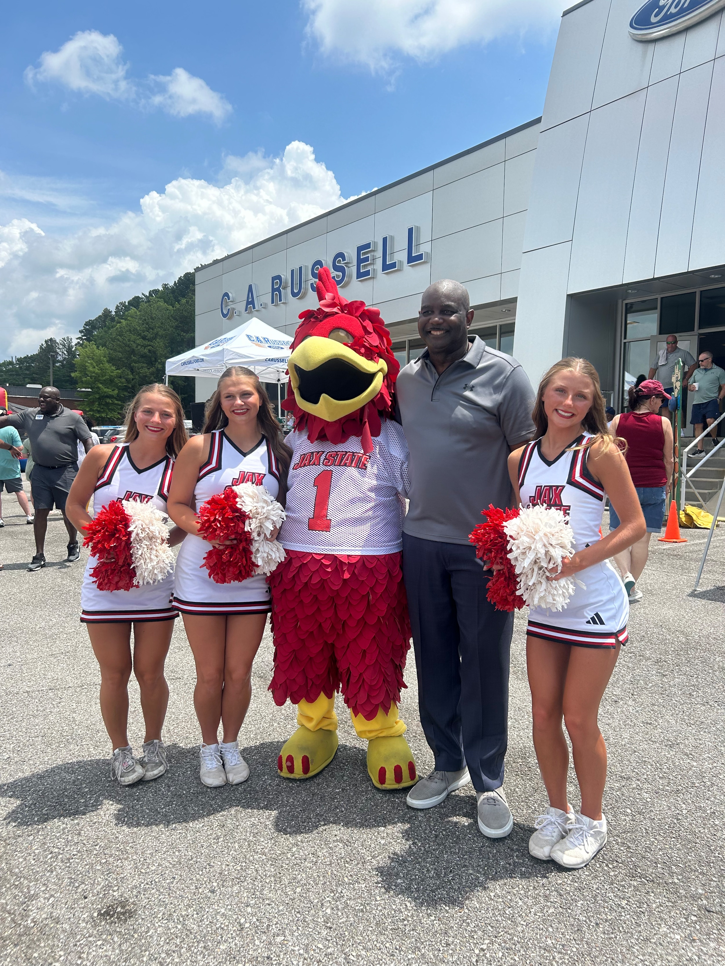 Tony Russell with JAX State Cheerleaders