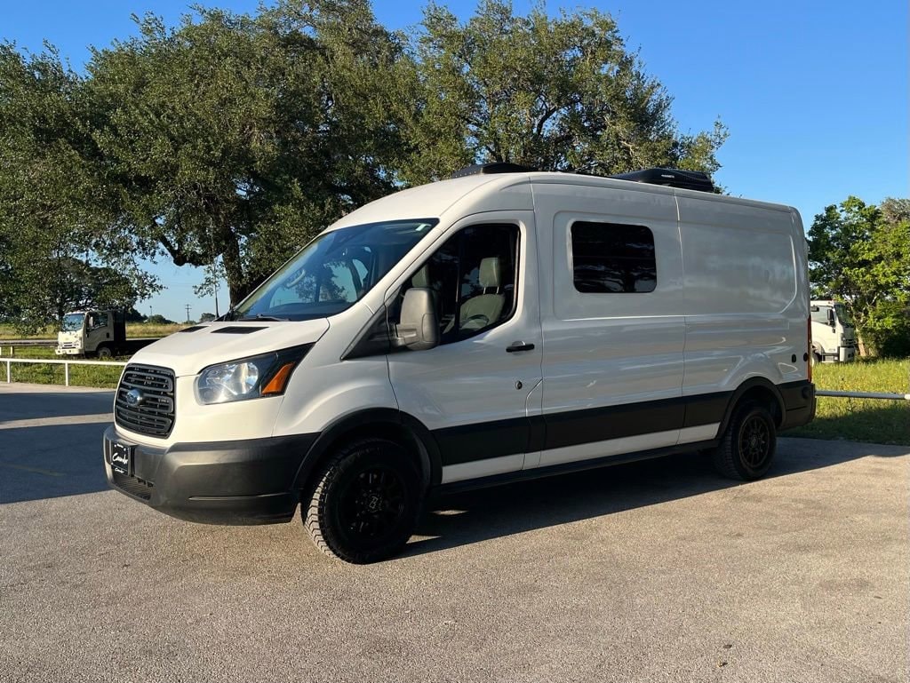 2019 Ford Transit 150 Med Roof Sliding Pass. 148 WB's photo