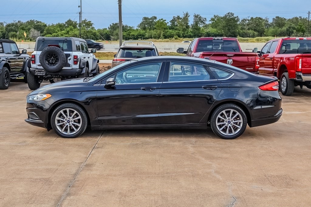 Used 2017 Ford Fusion SE with VIN 3FA6P0H7XHR161030 for sale in Columbus, TX